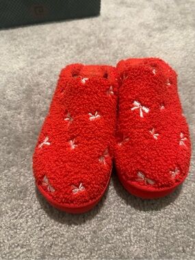 Cozy Red Slip-On Plush Slippers with White Bow Accents